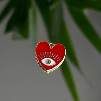 Blue/green eye heart - Charm