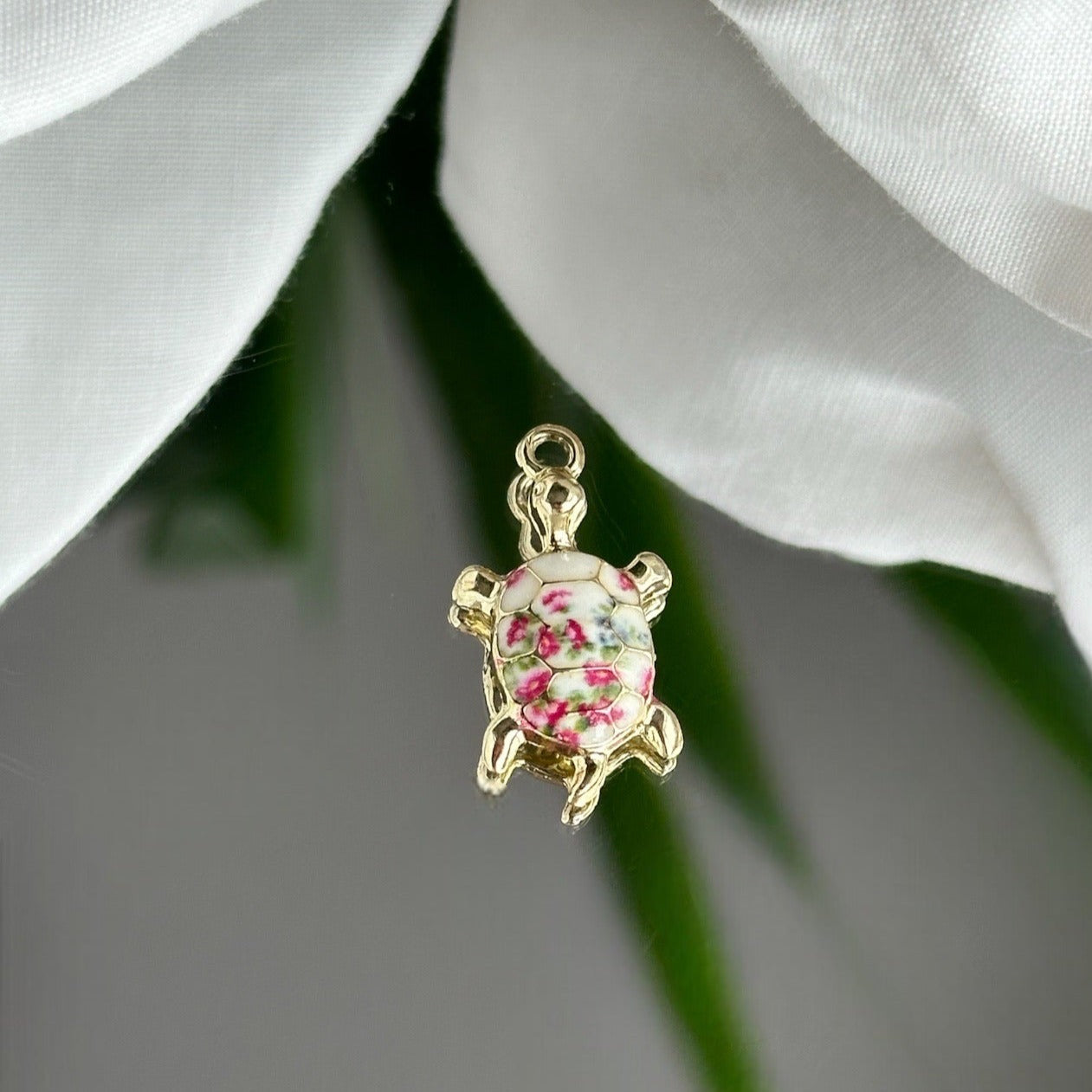 White turtle with pink flowers - Charm