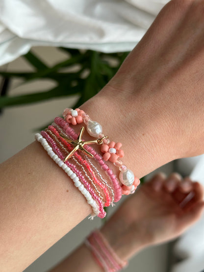 Conjunto de pulseras playa rosa