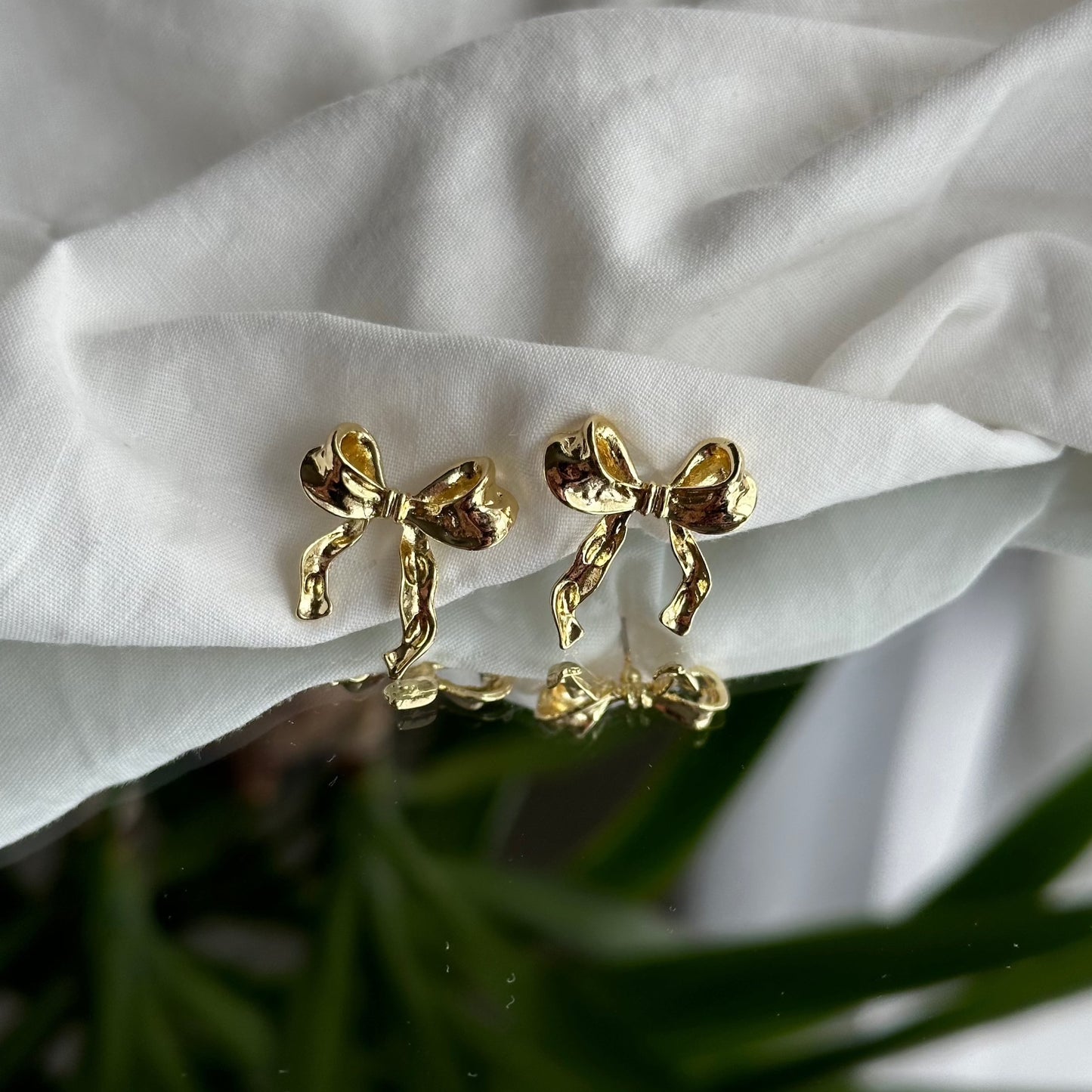 Petites boucles d'oreilles noeuds