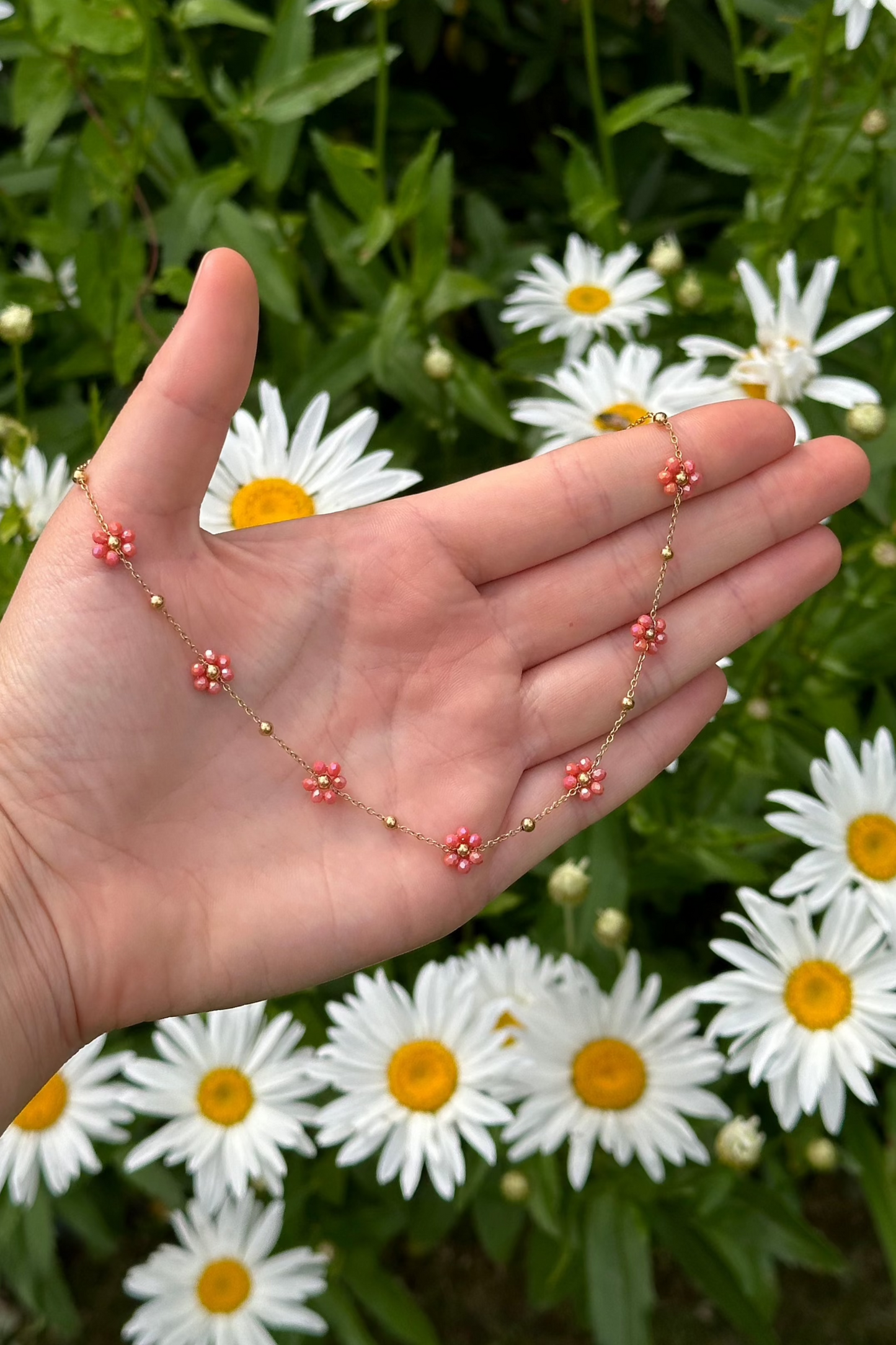 Collier petites fleurs corail